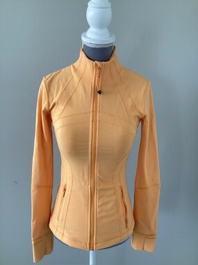 Lululemon Define Women’s Zip Jacket in Luon in a Melon colour.